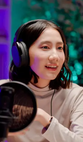 Person speaking wearing headsets