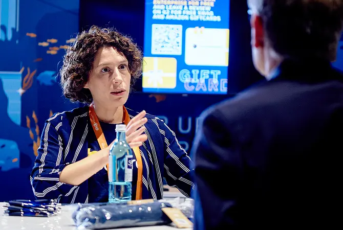 two people networking at an event